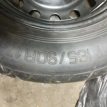 Транспорт: Запасное «докатка» колесо в сборе (стальной диск + шина) — 3