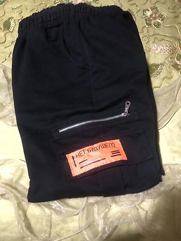 Kişi geyimləri: Qara rəngli kişilər/üniseks karqo şalvar - Model: jogger/kargo üslubu — 1