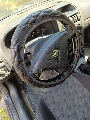 opel astra 2015: Opel Astra Caravan (universał) – tünd mavi rəng, 5 qapı, geniş baqajlı — 8