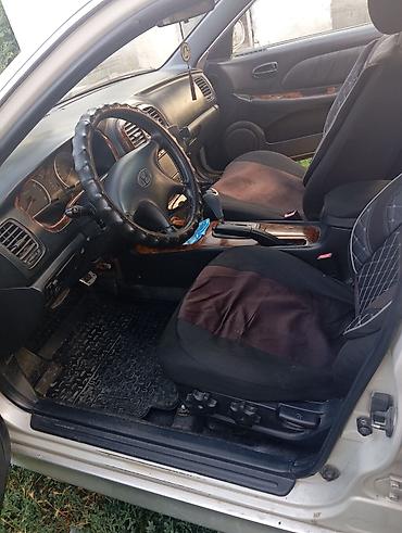 солярис 2 поколения: Hyundai Sonata: 2002 г., 1.8 л, Автомат, Газ, Седан — 5