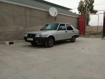 Tofas: Model: Tofas Şahin/Doğan tipli sedan (4 qapı) Rəng: Gümüşü Yanacaq — 2