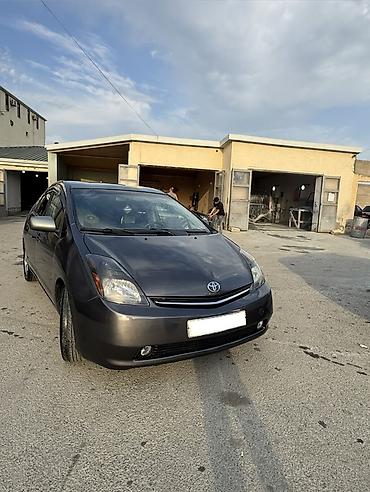 Toyota Prius (2-ci nəsil) hibrid hetçbek - Rəng: tünd boz/metallic -