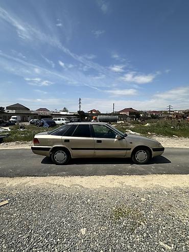 Opel: Model: daevoo Espero Rəng: qızılı/şampan Kuzov: 4 qapı, geniş salon — 3