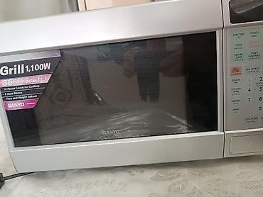 Mətbəx texnikası: SANYO Cook ‘n’ Grill mikrodalğalı soba Xüsusiyyətlər: - 1 100 W güc — 5