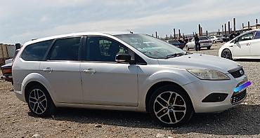 Ford: Ford Focus Wagon – gümüşü rəng, universał kuzov Xüsusiyyətlər: - — 6