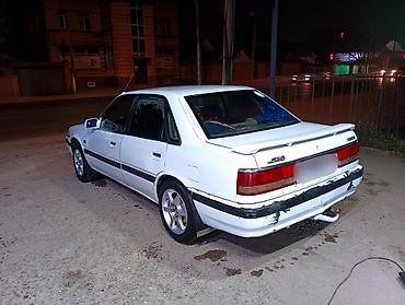 bmw e34 2 8: Mazda 626: 1988 г., 2 л — 3