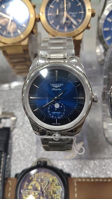 bakida saat: Longines Flagship avtomatik kişi qol saatı - Korpus və bilərzik — 2
