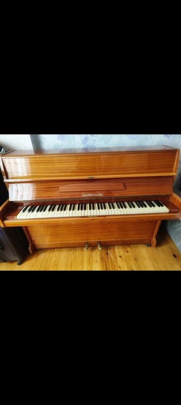 Cadillac: Zimmerman piano.qiymet 650 man.Almaniya istehsali yaxsi