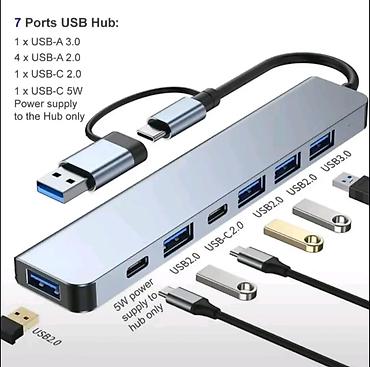 pc baku: 7 Portlu USB Hub – USB-C + USB-A 2‑in‑1 Xüsusiyyətlər: - Ümumi 7 port — 1