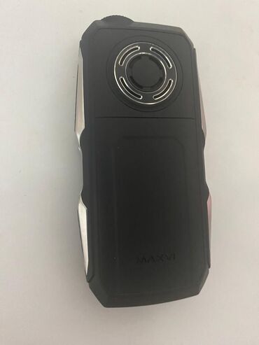 Другие мобильные телефоны: Мобильный телефон MAXVI T5 в черном корпусе с серебристыми вставками