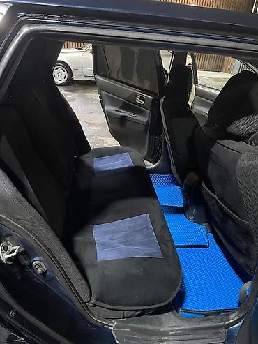 bmw ix3: Mitsubishi Lancer: 2005 г., 2 л, Механика, Универсал — 5