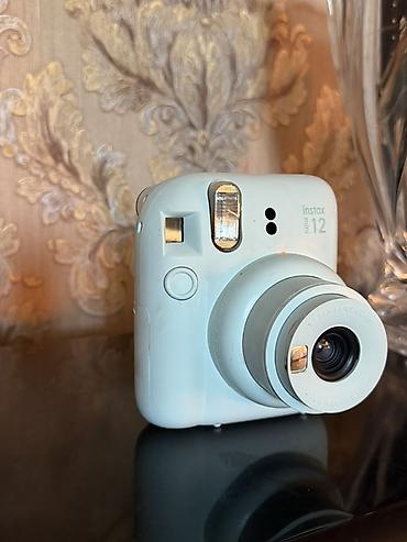 мини фото парат i: Fujifilm Instax mini 12 — компактная моментальная камера в мятном — 1