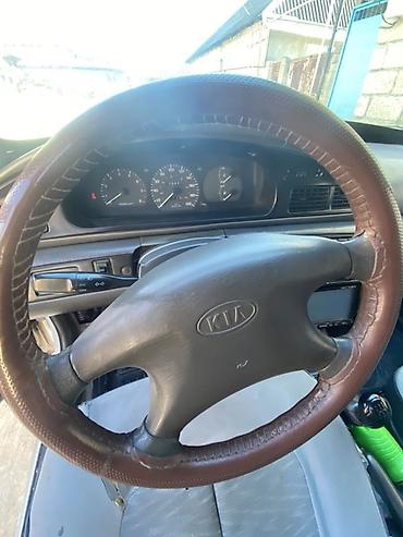 Kia: Kia Sephia: 1.5 l | 1997 il Sedan — 10