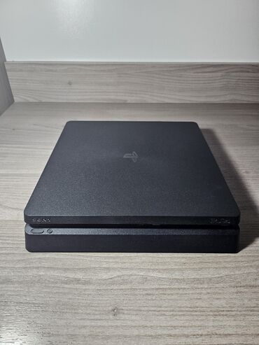 pes 4 slim: Игровая консоль Sony PlayStation 4 Slim в комплекте с двумя