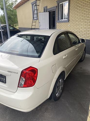 токмок бетон: Chevrolet : 2014 г., 1.6 л, Кол менен иштөөчү, Бензин, Седан — 5