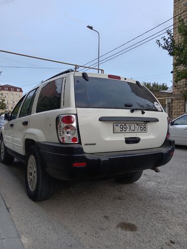 Jeep: Jeep Grand Cherokee: 0.4 l | 2001 il | 445444 km Universal