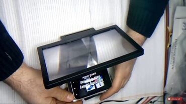 Ostali aksesoari za mobilne telefone: Postolje za telefon. Uveličava ako se nešto sa telefona gleda. A i za — 3