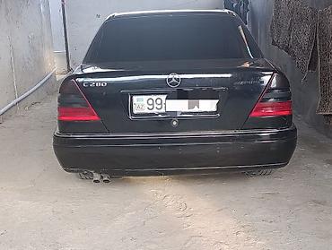w202 duman: Mercedes-Benz C280 (W202), qara rəng. - Benzin mühərriki, arxa — 2
