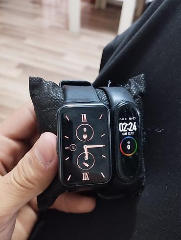 Saat dəstləri: Huawei TIA-B09 Biri Isə Xiomi Mi Band-4 du Her ikiside Orginal Saatdi — 7