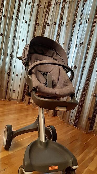 lulka: Stokke kolyaska, seliqeli islenib, iki dene başligi (lulka) var, biri — 2