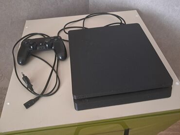 сколько стоит nintendo switch: PlayStation 4 Slim oyun konsolu. 2 TB yaddaşı var,9.00 versiyadır