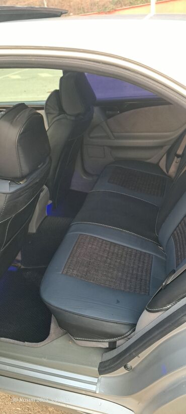 Mercedes-Benz: Mercedes-Benz E-Class (W210) sedan - Gümüş rəng, 4 qapı - Ön dəyirmi — 14