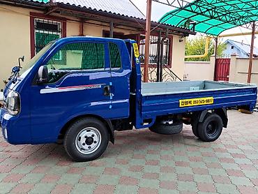 күзгү: Kia Bongo III, малотоннажный бортовой грузовик (синий). Кузов и — 7