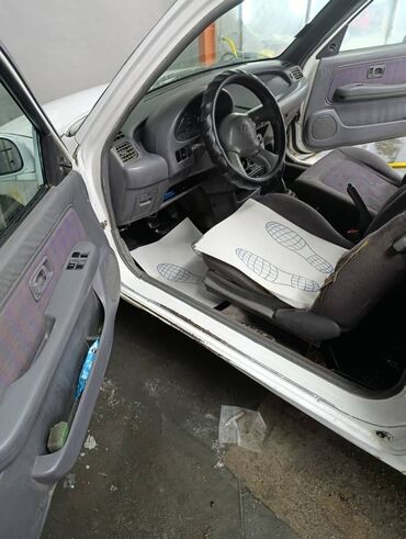 автомобиль в кредит без первоначального взноса: Nissan Micra: 1995 г., 1.3 л, Механика, Бензин, Купе
