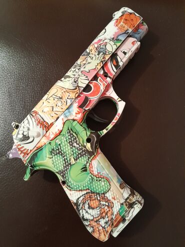 детский комбинзон: Орбизный игрушечный пистолет.в отличном состаянии. Орбиз менен атчуу