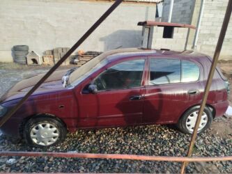 обмен машинами с доплатой: Nissan Almera: 2005 г., 1.8 л, Автомат, Бензин