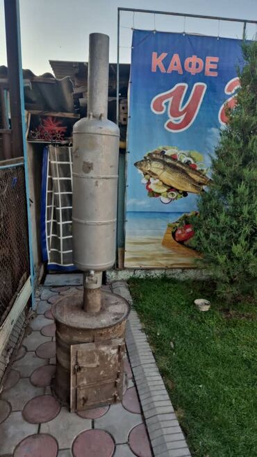 котлы на отработке: Металлическая печь для бани или сауны. Имеет прямоугольную топку с