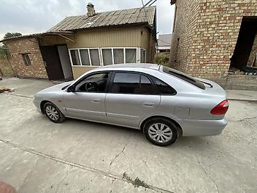 аморт одиссей: Mazda Capella: 2000 г., Механика, Бензин, Седан — 5