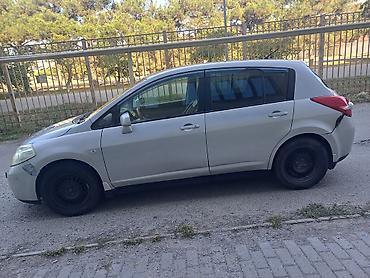 Nissan: Nissan Tiida: 1.5 l | 2011 il Hetçbek — 4