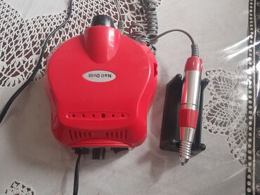 Manikür, pedikür aparatları: Elektrikli dırnaq frezası, manikür və pedikür üçün istifadə olunan