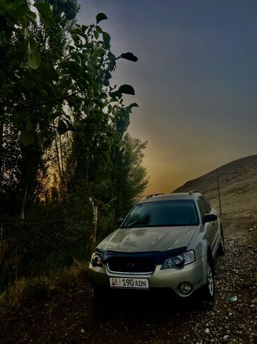бампер спейс стар: Автомобиль Subaru Outback в цвете "шампань" с защитным дефлектором