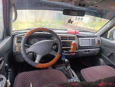 Унаа: Mitsubishi Montero Sport: 1997 г., 2.4 л, Кол менен иштөөчү, Бензин, Жол тандабас — 7