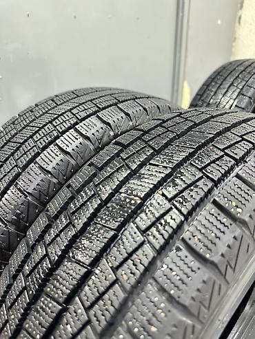 зимние шины на 14: Комплект автомобильных шин Goform размером 185/70 R14 88T. Зимние — 4