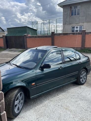машина жонундо маалымат кыргызча: Зеленый седан Honda Civic с люком на крыше. Автомобиль оснащен литыми