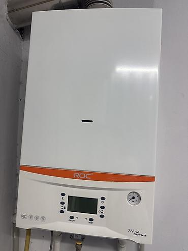 наружний блок: Газовый настенный котел ROC Mini Series, модель N1PB12-X5BP.Почти — 1