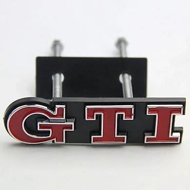 dozer za prihranu: GTI znak za prednju resetku. Dosta znakova u ponudi (Audi, VW — 2