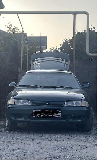 купить заднюю камеру на машину: Mazda 626: 1993 г., 1.8 л, Механика, Бензин, Седан — 1
