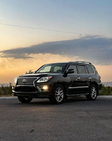 купить диски на 18 бу: Черный внедорожник Lexus LX 570 с хромированными элементами отделки и