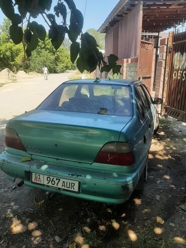 купить запчасти опель омега б: Автомобиль Daewoo Nexia зеленого цвета, тип кузова седан. Оборудован