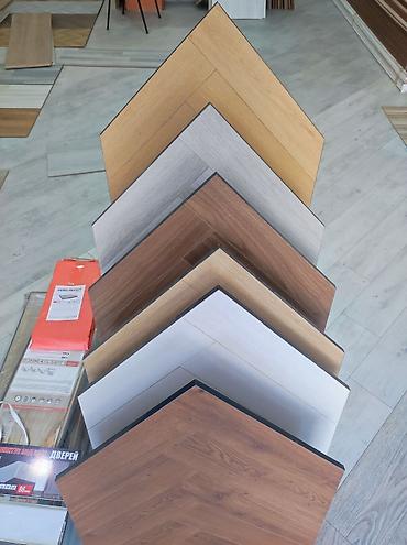 Laminat döşəmə lövhələri – müxtəlif rəng və teksturalarda - Material