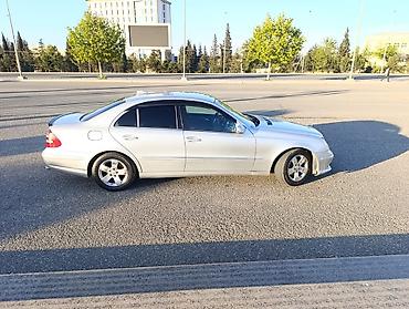 w211 duman: Mercedes-Benz E-Class sedan (W211), gümüşü rəng. Xüsusiyyətlər: - — 5