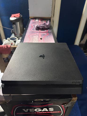 ev ucun soyducular: PlayStation 4 Slim oyun konsolu. Kompakt və zərif dizayna malik PS4 — 1