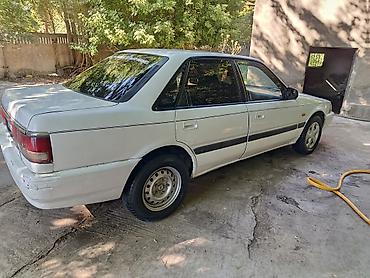 полироль для авто: Mazda 626: 1991 г., 2 л, Механика, Бензин, Седан — 2