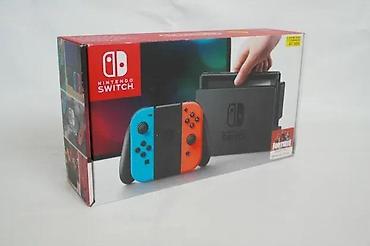 Nintendo Switch: Sređen tekst: Nintendo Switch V1 sa originalnom kutijom. Konzola je u — 2