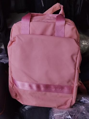 kipling monkey: Розовый городской рюкзак с лаконичным дизайном. Характеристики: - — 1