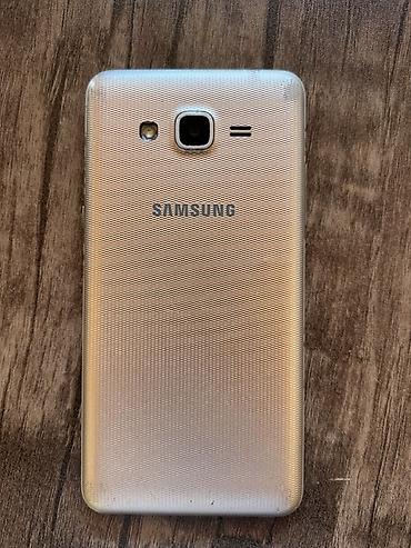 asus zenfone 3: Samsung Galaxy J2 Prime, rəng - Qızılı, İki sim kartlı — 1
